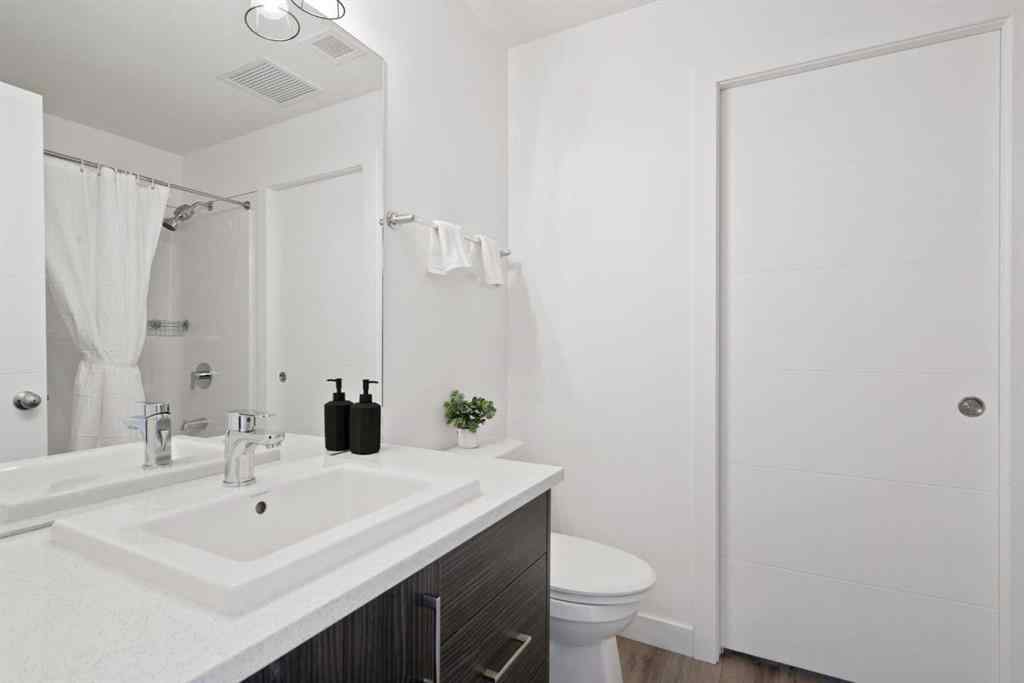 MLS® A2251676 - Unit #217 205 Spring Creek Common SW in Springbank Hill Calgary, Residential