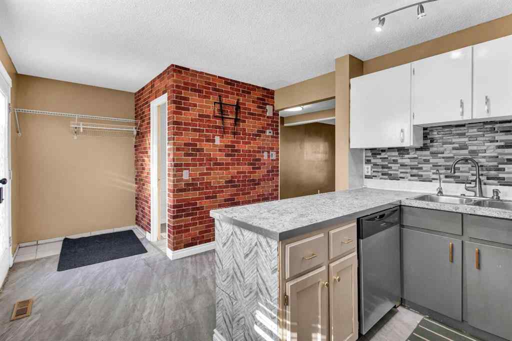 MLS® A2251705 - 32 Erin Mount Crescent SE in Erin Woods Calgary, Residential
