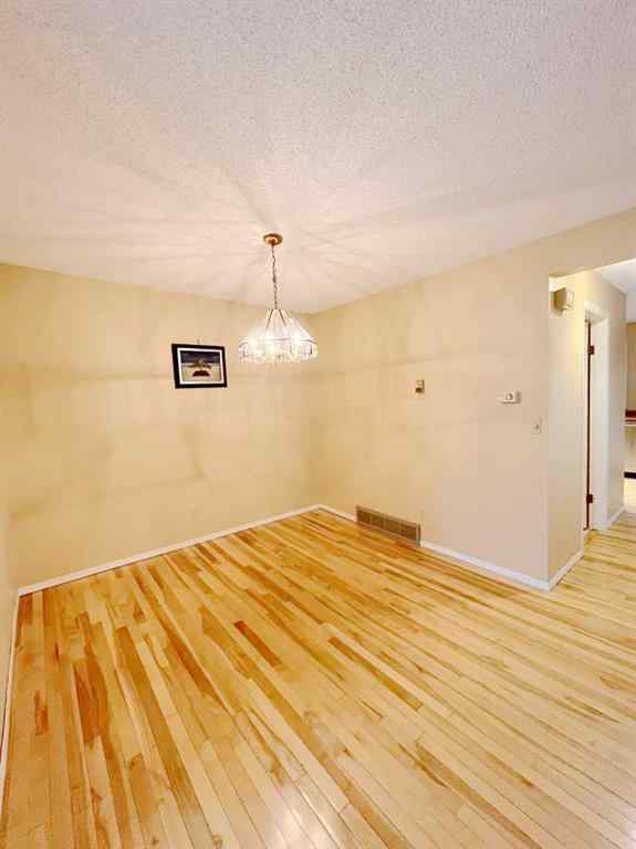 MLS® A2251709 - 33 Millrise Lane SW in Millrise Calgary, Residential