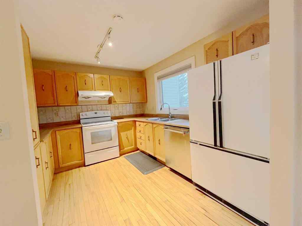 MLS® A2251709 - 33 Millrise Lane SW in Millrise Calgary, Residential