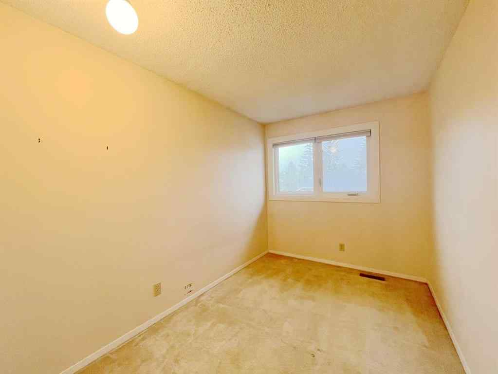 MLS® A2251709 - 33 Millrise Lane SW in Millrise Calgary, Residential