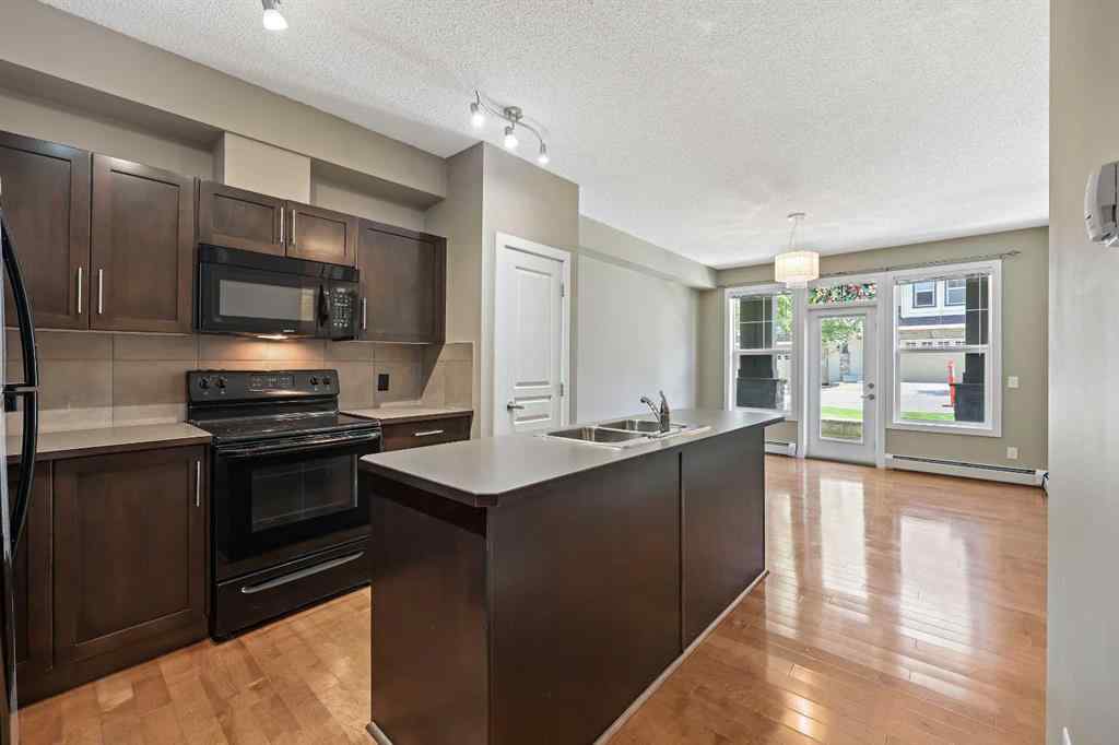 MLS® A2251710 - Unit #102 48 Panatella Road NW in Panorama Hills Calgary, Residential