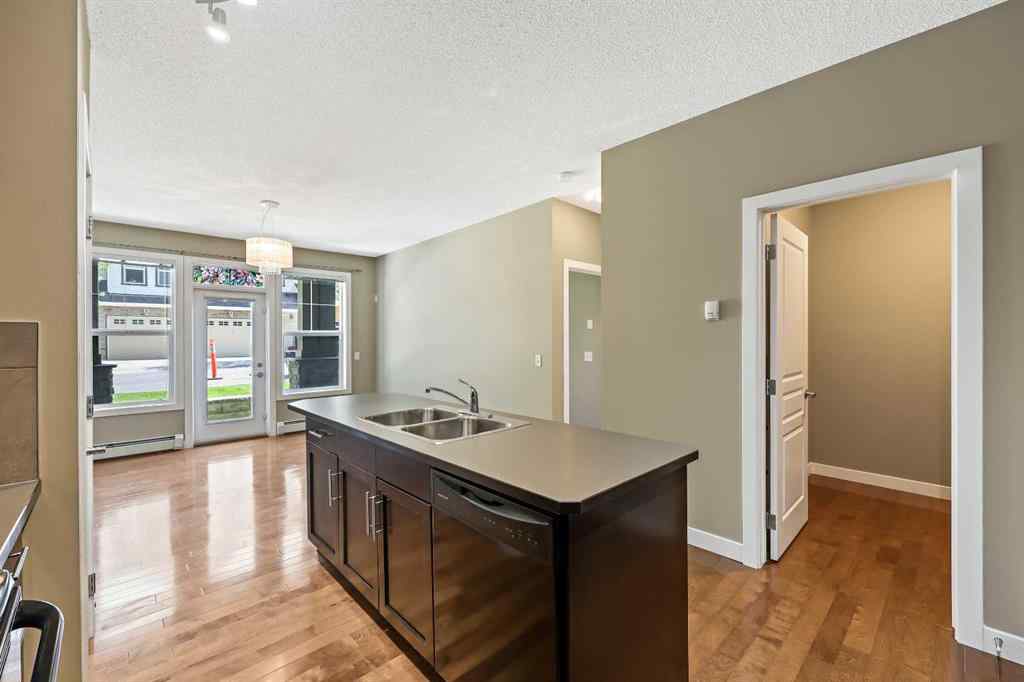 MLS® A2251710 - Unit #102 48 Panatella Road NW in Panorama Hills Calgary, Residential