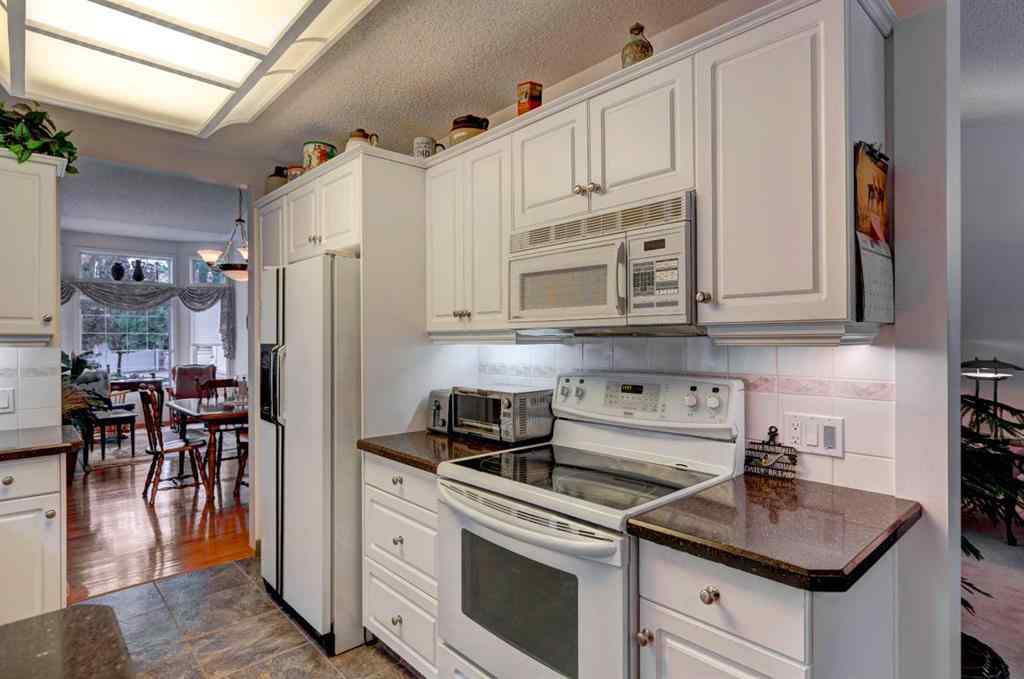 MLS® A2251754 - 62 Mt Mckenzie Villas SE in McKenzie Lake Calgary, Residential