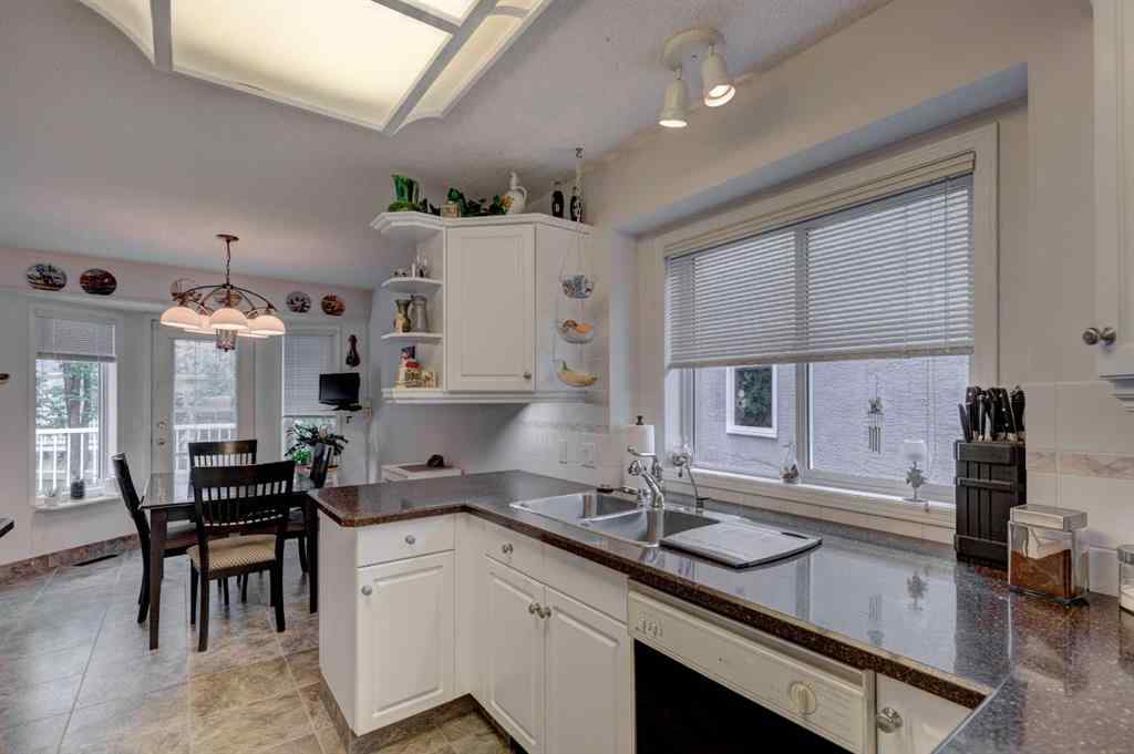 MLS® A2251754 - 62 Mt Mckenzie Villas SE in McKenzie Lake Calgary, Residential