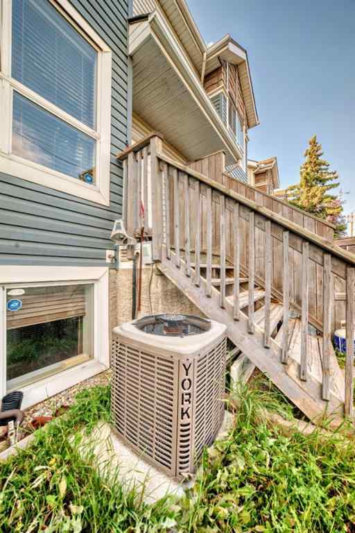 MLS® A2251797 - 70 Erin Woods Court SE in Erin Woods Calgary, Residential