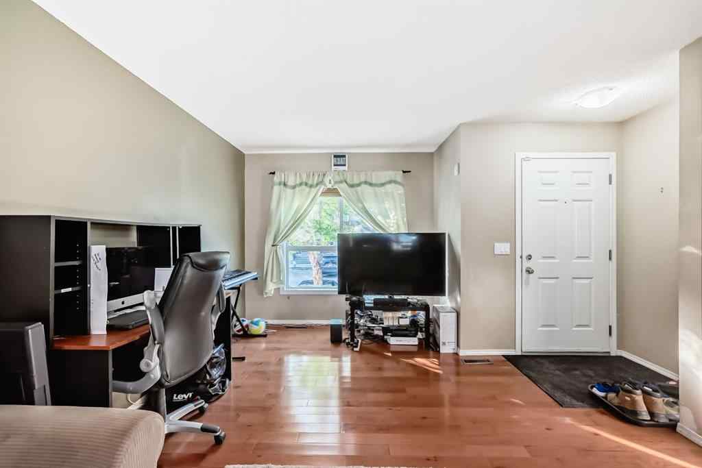 MLS® A2251797 - 70 Erin Woods Court SE in Erin Woods Calgary, Residential