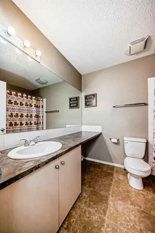 MLS® A2251797 - 70 Erin Woods Court SE in Erin Woods Calgary, Residential