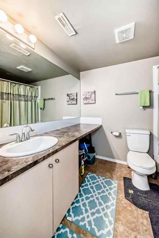 MLS® A2251797 - 70 Erin Woods Court SE in Erin Woods Calgary, Residential