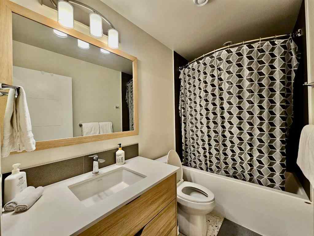 MLS® A2251804 - Unit #202I 209 Stewart Creek Rise  in Three Sisters Canmore, Residential