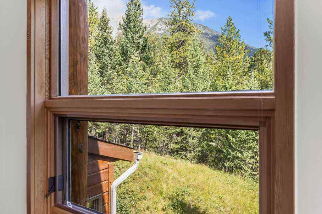 MLS® A2251831 - 24 Blue Grouse Ridge  in Silvertip Canmore, Residential