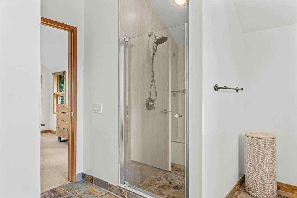 MLS® A2251831 - 24 Blue Grouse Ridge  in Silvertip Canmore, Residential