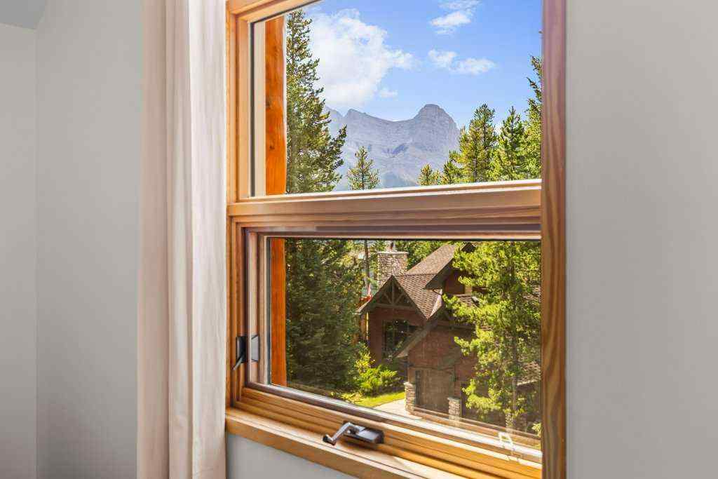 MLS® A2251831 - 24 Blue Grouse Ridge  in Silvertip Canmore, Residential