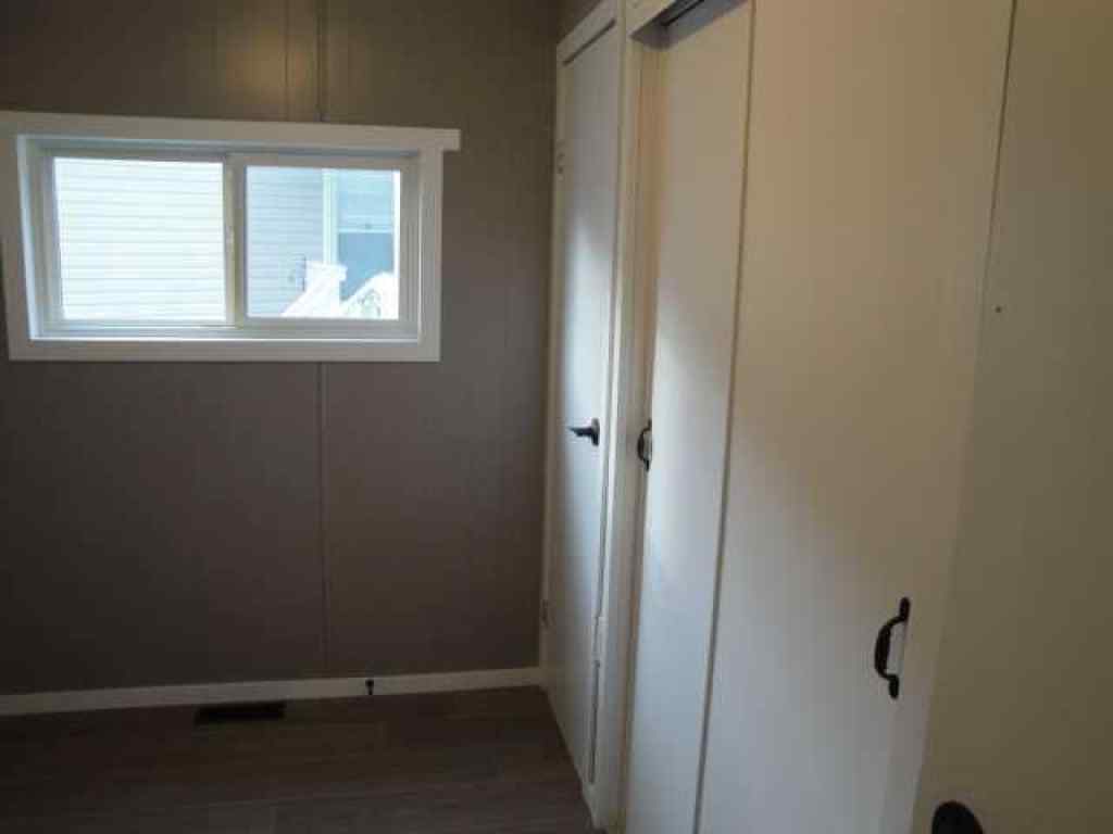 MLS® A2251866 - Unit #297 2300 13th Street N in Bridge Villa Estates Lethbridge, Mobile