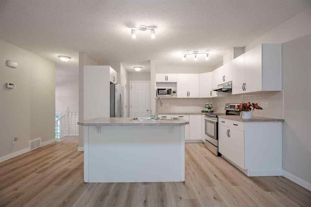 MLS® A2251883 - 1450 Smith Avenue  in NONE Crossfield, Residential