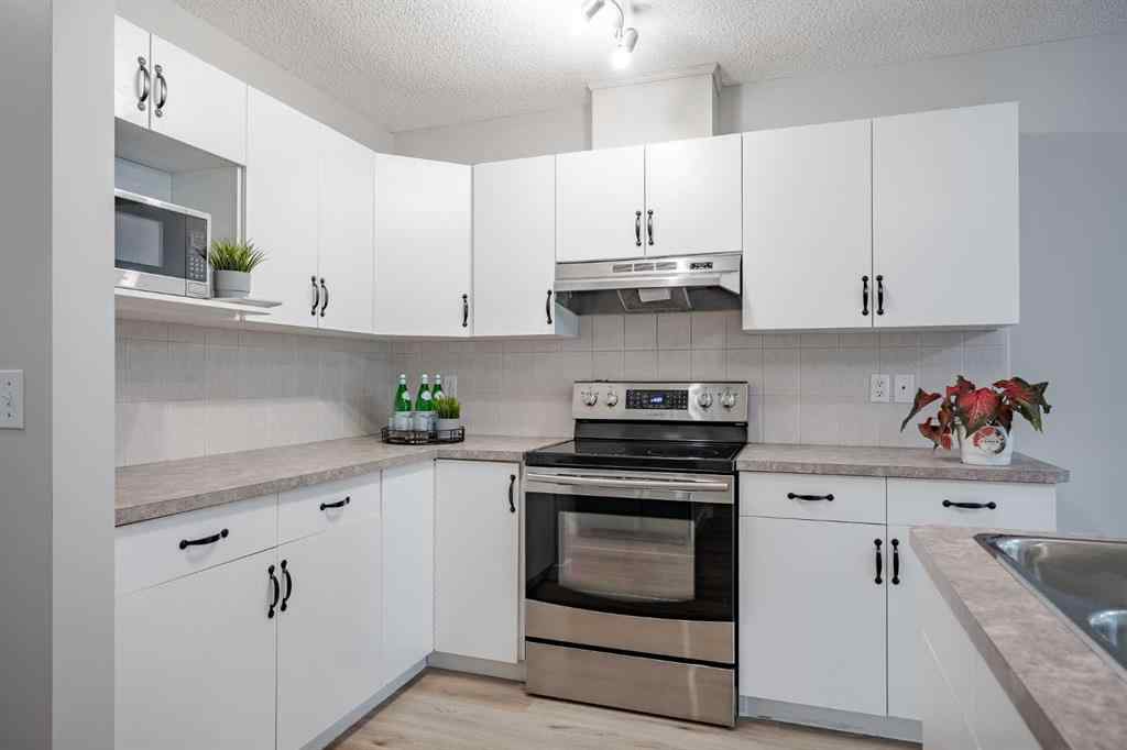 MLS® A2251883 - 1450 Smith Avenue  in NONE Crossfield, Residential