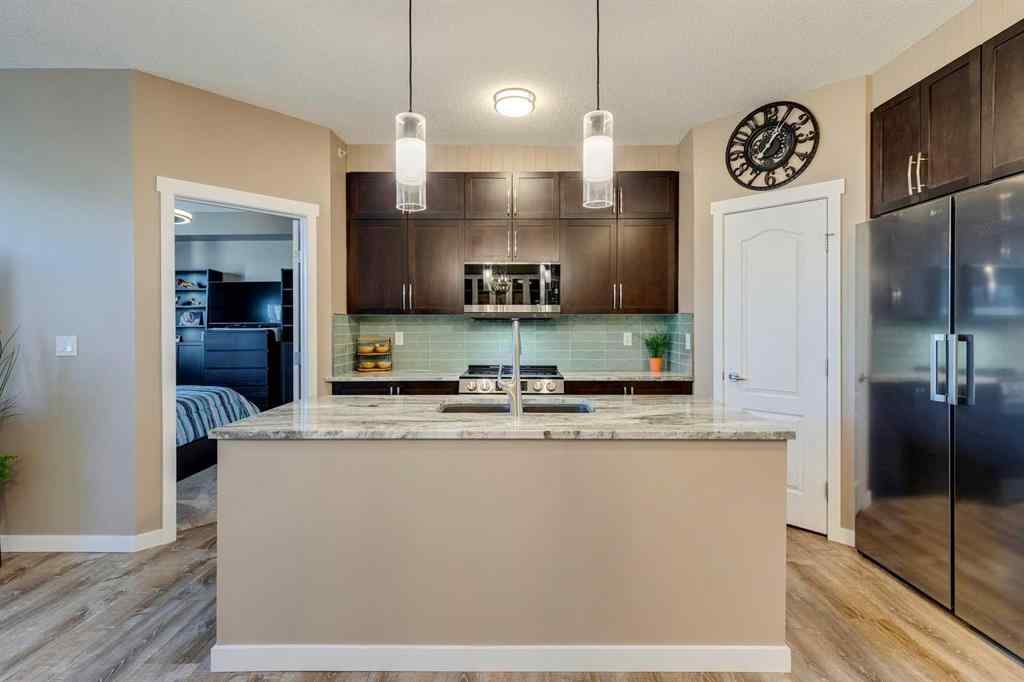 MLS® A2251933 - Unit #405 1 Crystal Green Lane  in Crystal Green Okotoks, Residential