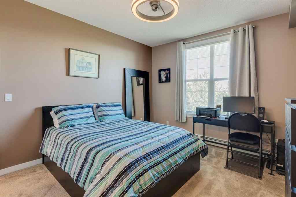 MLS® A2251933 - Unit #405 1 Crystal Green Lane  in Crystal Green Okotoks, Residential
