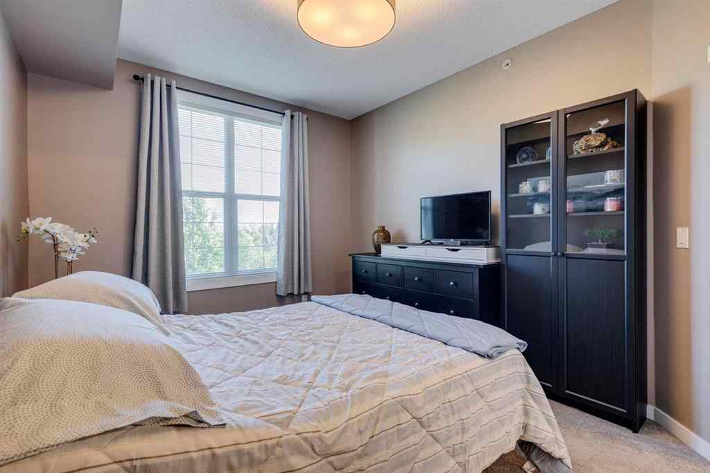 MLS® A2251933 - Unit #405 1 Crystal Green Lane  in Crystal Green Okotoks, Residential