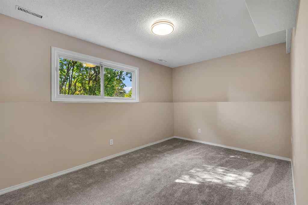 MLS® A2251955 - 105 Fonda Court SE in Forest Heights Calgary, Residential