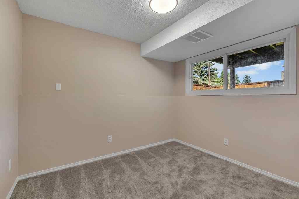 MLS® A2251955 - 105 Fonda Court SE in Forest Heights Calgary, Residential