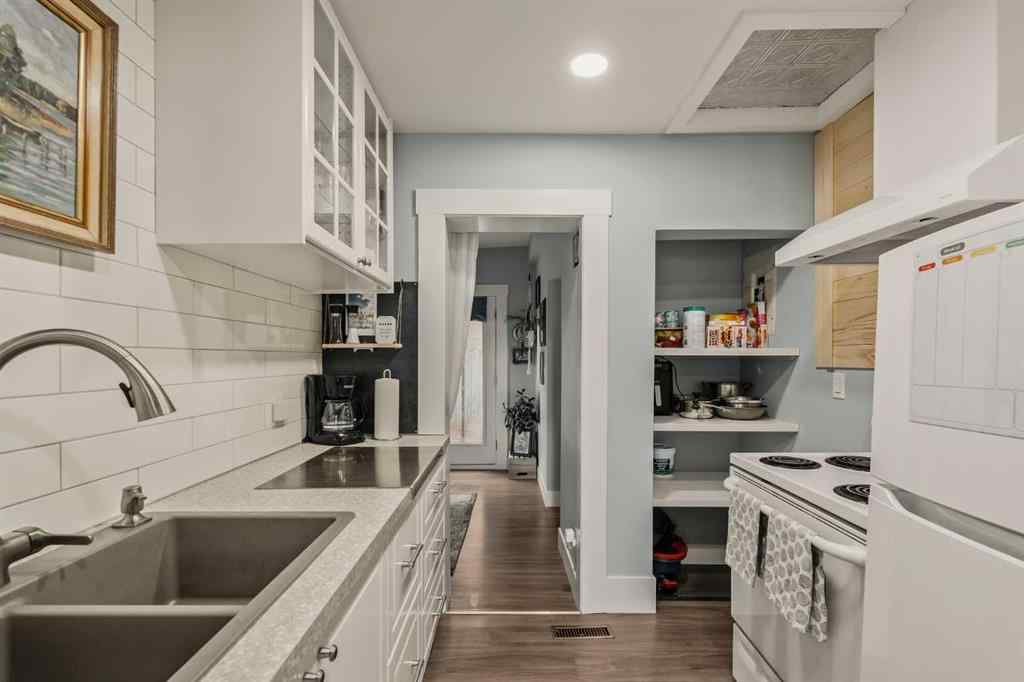 MLS® A2251959 - 703 14A Street SE in Inglewood Calgary, Residential