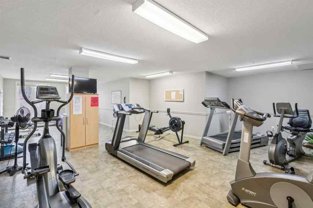 MLS® A2251963 - Unit #108 15 Everstone Drive SW in Evergreen Calgary, Residential