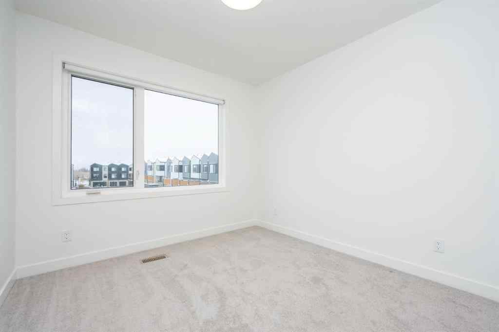 MLS® A2251973 - Unit #412 8535 19 Avenue SE in Belvedere Calgary, Residential