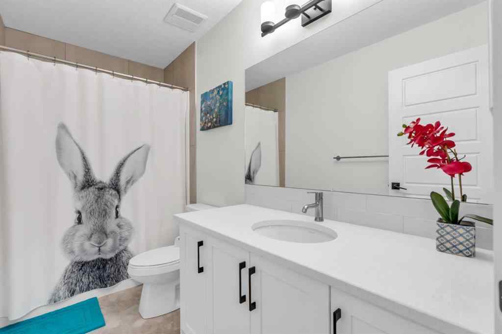MLS® A2251979 - 35 Versant View SW in Alpine Park Calgary, Residential