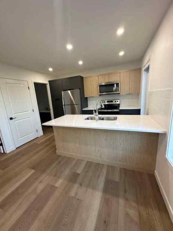 MLS® A2251986 - 23 Trent Road W in Varsity Village Lethbridge, Residential