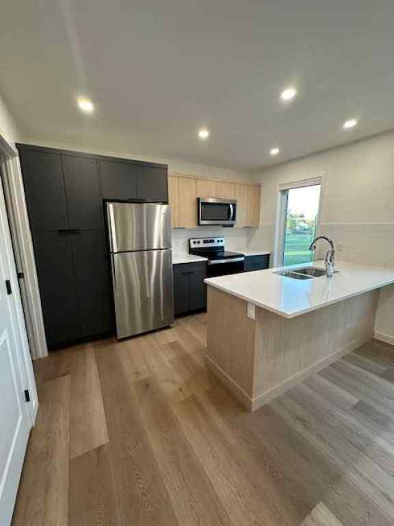 MLS® A2251986 - 23 Trent Road W in Varsity Village Lethbridge, Residential