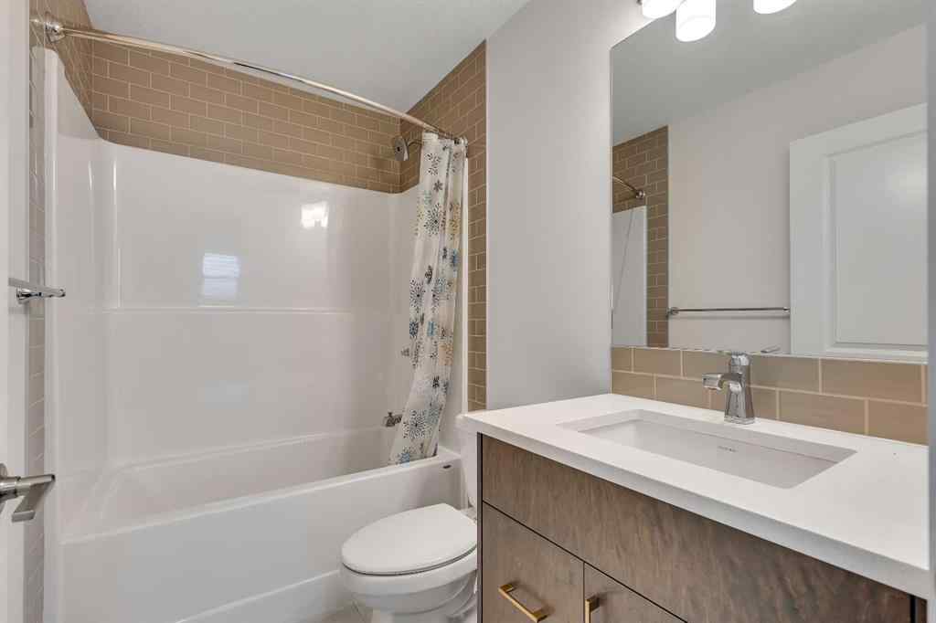 MLS® A2252004 - 211 Creekstone Row SW in Pine Creek Calgary, Residential