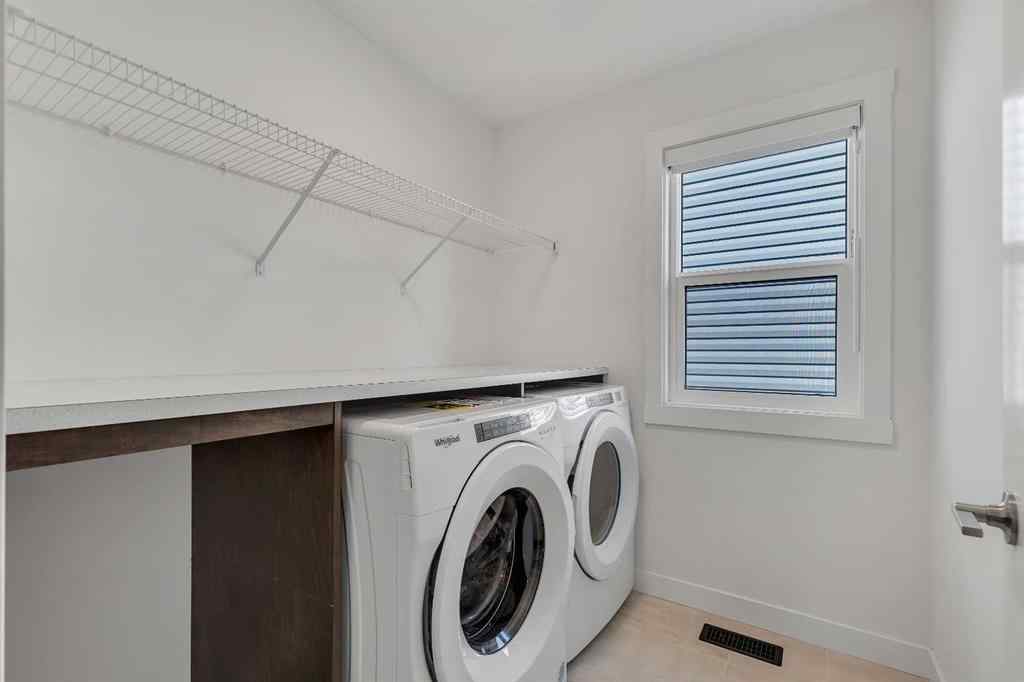 MLS® A2252004 - 211 Creekstone Row SW in Pine Creek Calgary, Residential