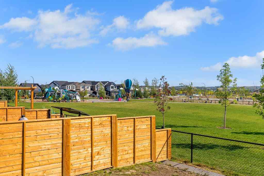 MLS® A2252004 - 211 Creekstone Row SW in Pine Creek Calgary, Residential