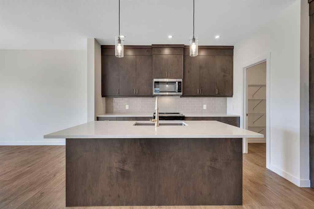 MLS® A2252004 - 211 Creekstone Row SW in Pine Creek Calgary, Residential
