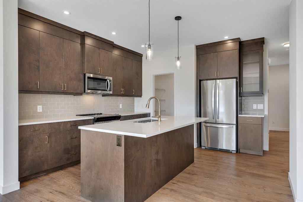 MLS® A2252004 - 211 Creekstone Row SW in Pine Creek Calgary, Residential