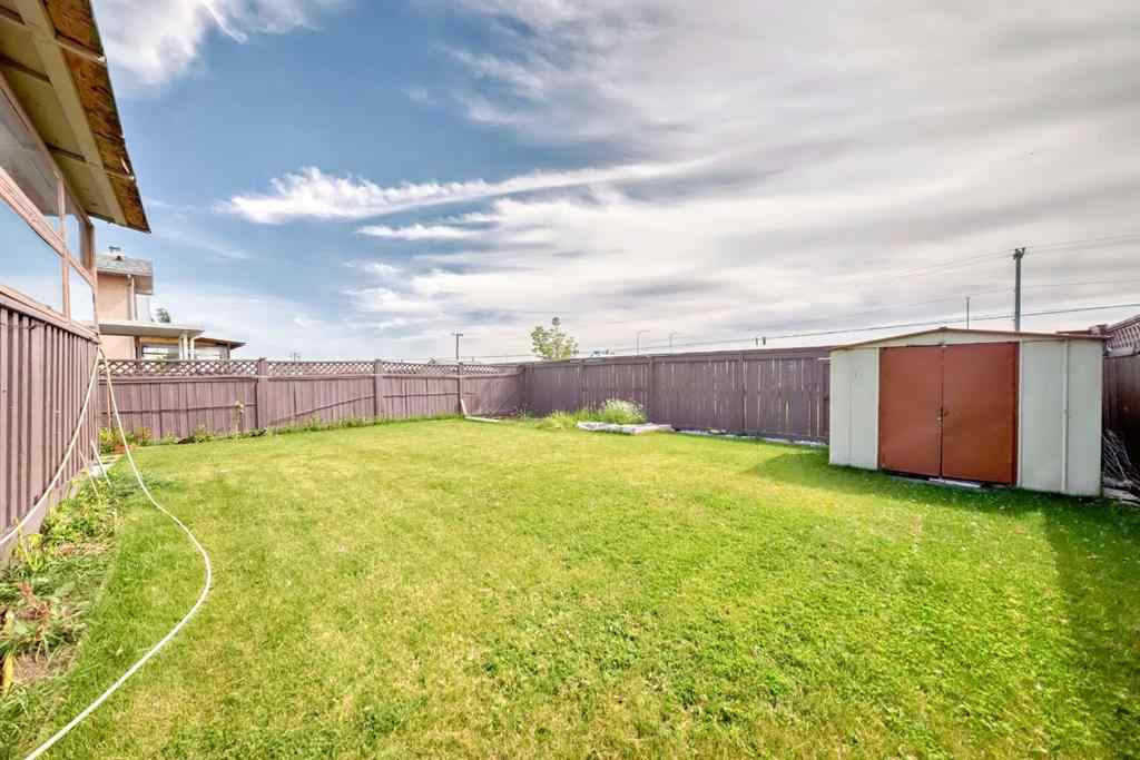 MLS® A2252009 - 105 Del Ray Road  in Monterey Park Calgary, Residential