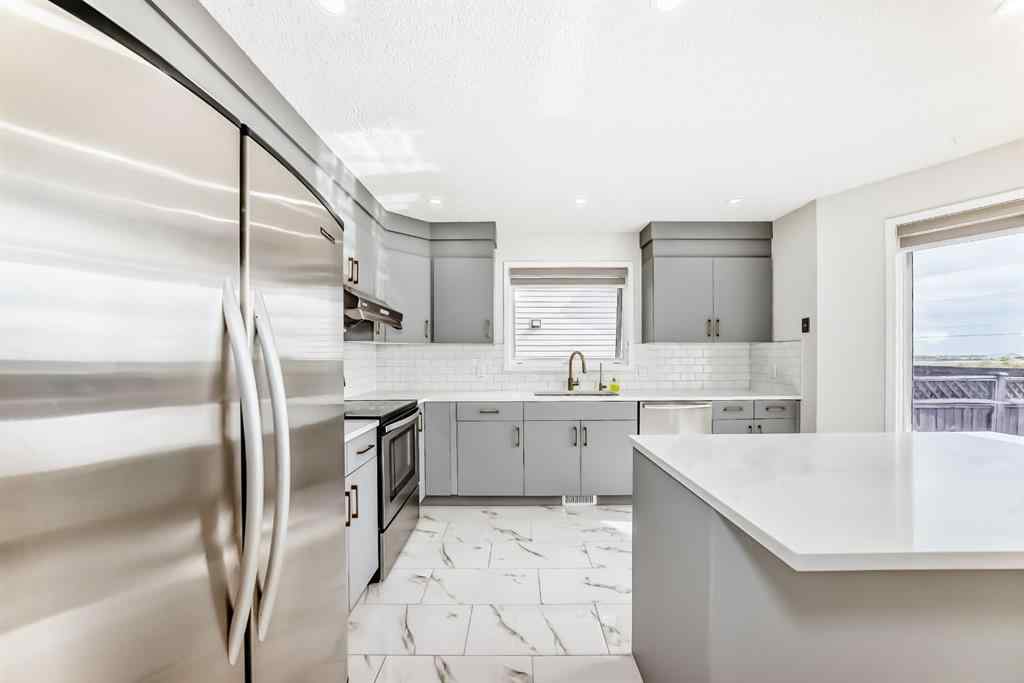 MLS® A2252009 - 105 Del Ray Road  in Monterey Park Calgary, Residential