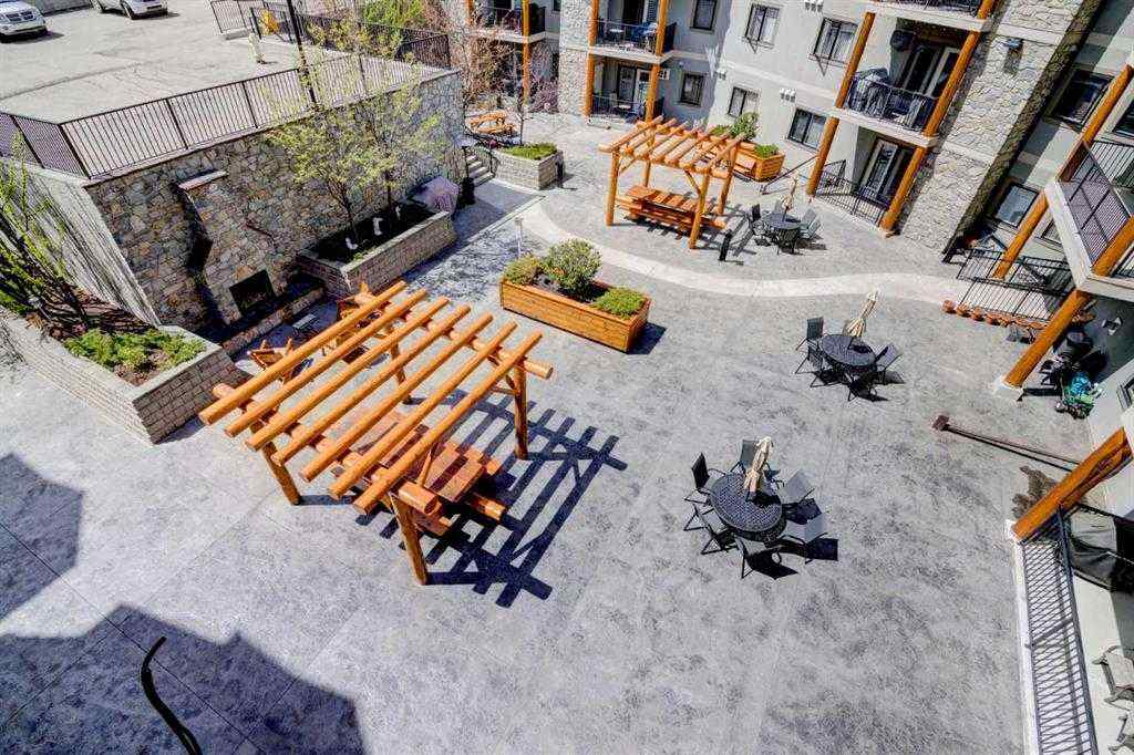 MLS® A2252019 - Unit #107 77 George Fox Trail  in Bow Meadows Cochrane, Residential