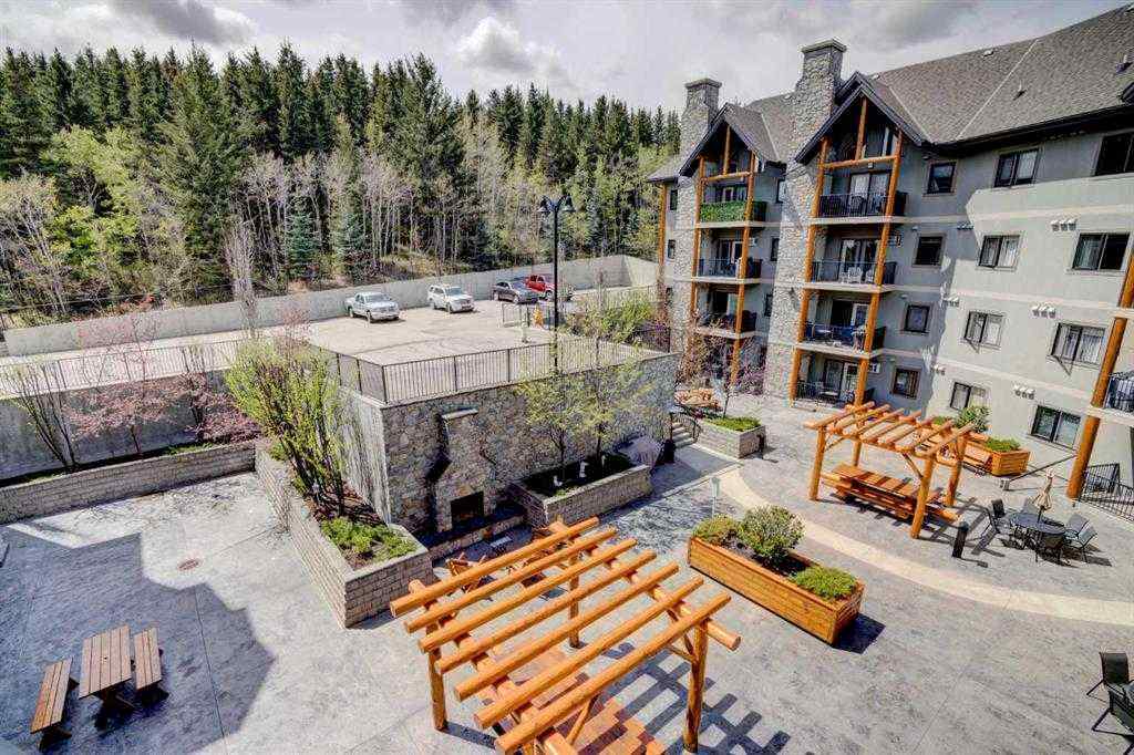 MLS® A2252019 - Unit #107 77 George Fox Trail  in Bow Meadows Cochrane, Residential
