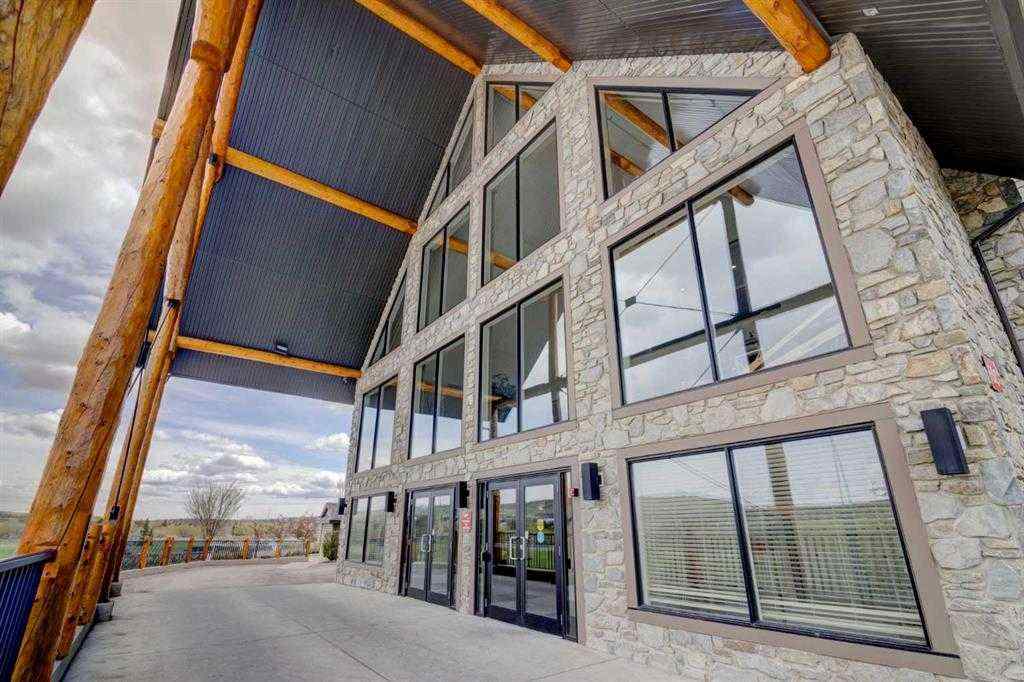 MLS® A2252019 - Unit #107 77 George Fox Trail  in Bow Meadows Cochrane, Residential