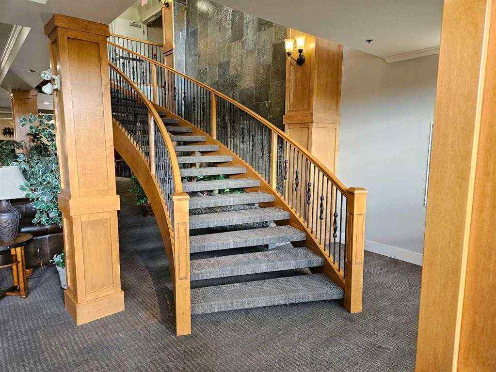 MLS® A2252019 - Unit #107 77 George Fox Trail  in Bow Meadows Cochrane, Residential