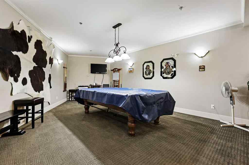 MLS® A2252019 - Unit #107 77 George Fox Trail  in Bow Meadows Cochrane, Residential