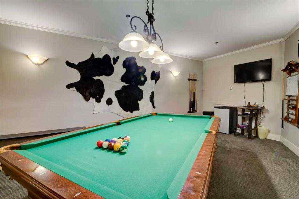 MLS® A2252019 - Unit #107 77 George Fox Trail  in Bow Meadows Cochrane, Residential
