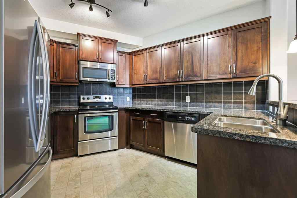 MLS® A2252019 - Unit #107 77 George Fox Trail  in Bow Meadows Cochrane, Residential