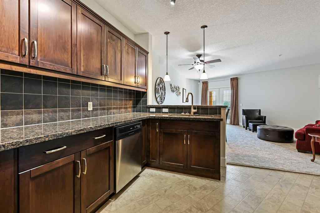 MLS® A2252019 - Unit #107 77 George Fox Trail  in Bow Meadows Cochrane, Residential