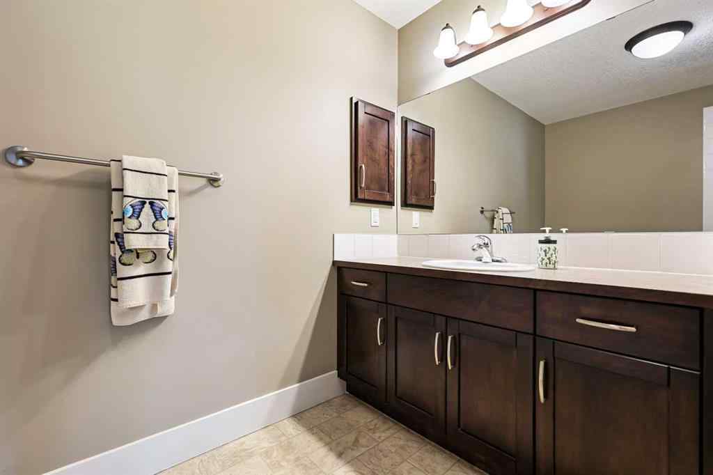 MLS® A2252019 - Unit #107 77 George Fox Trail  in Bow Meadows Cochrane, Residential