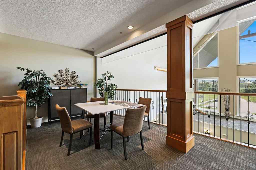 MLS® A2252019 - Unit #107 77 George Fox Trail  in Bow Meadows Cochrane, Residential