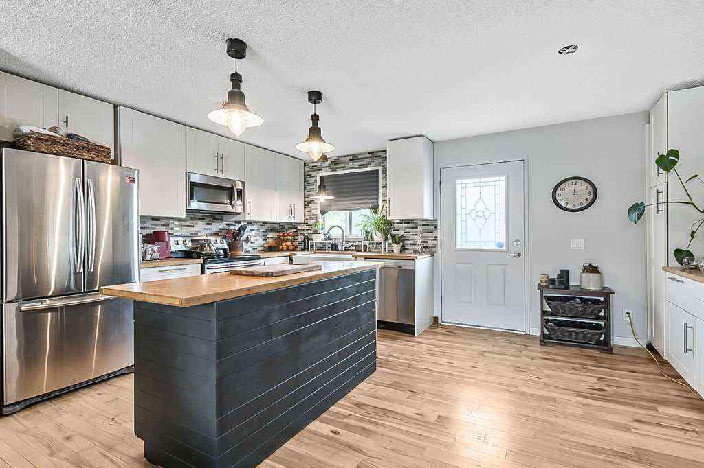 MLS® A2252036 - 201 Robert Street SW in NONE Diamond Valley, Residential