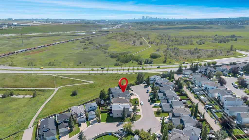 MLS® A2252042 - 140 Harvest Creek Court NE in Harvest Hills Calgary, Residential